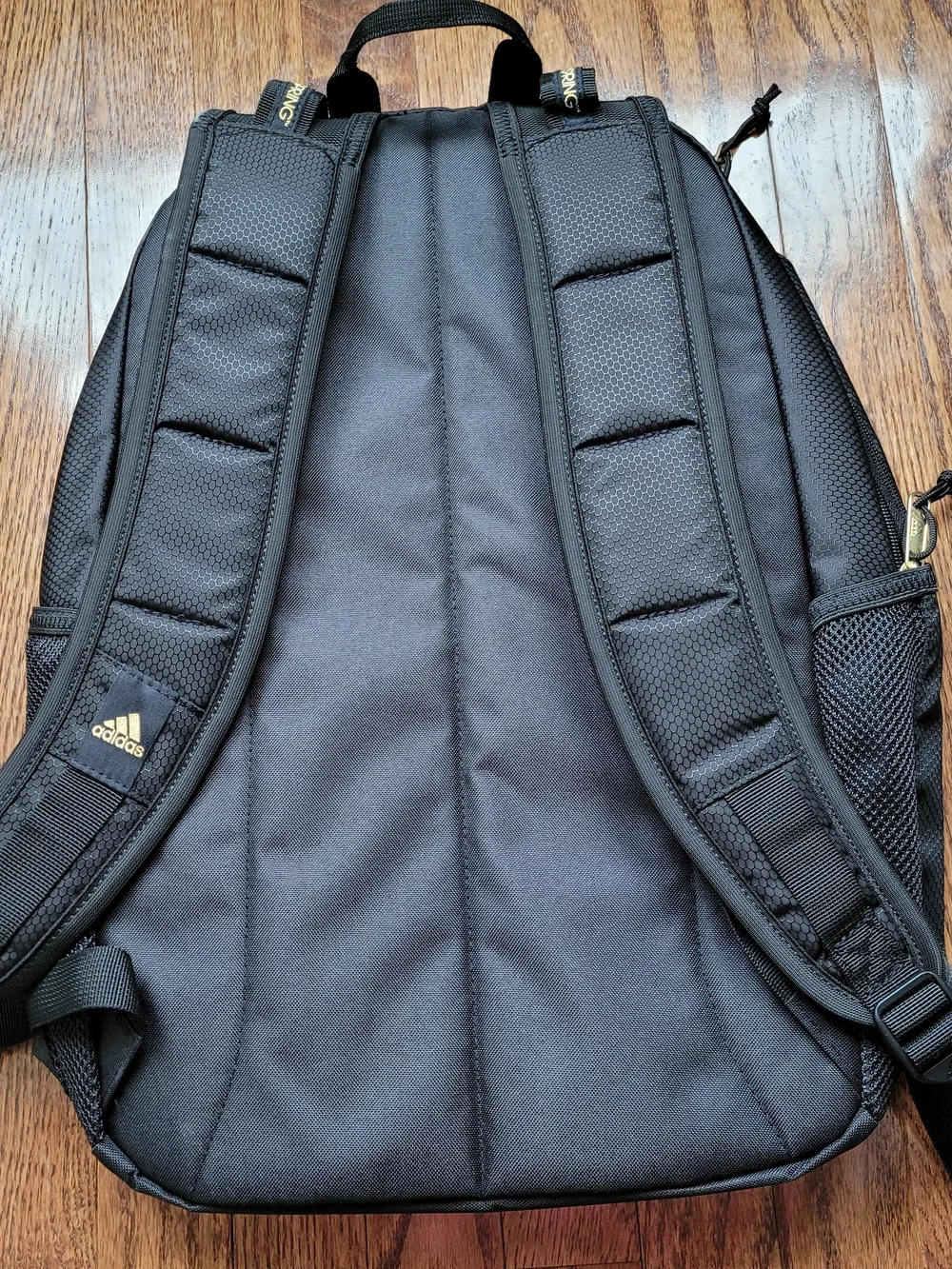 adidas Black Backpack with Gold Logo Accents